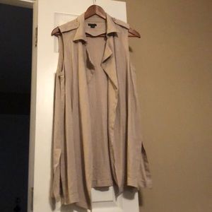 Khaki no sleeve thigh length cardigan